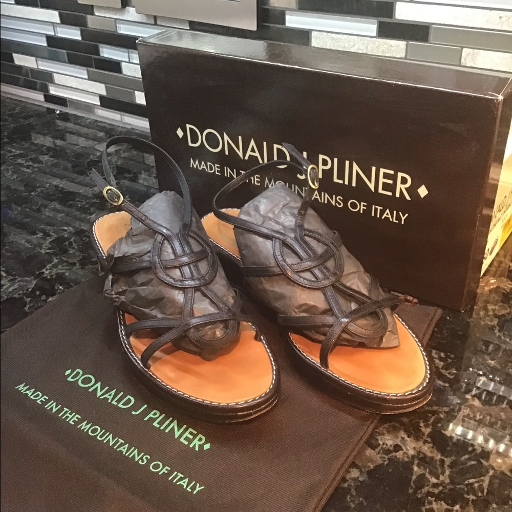Donald Pliner Low wedge heel black strapped sandal.